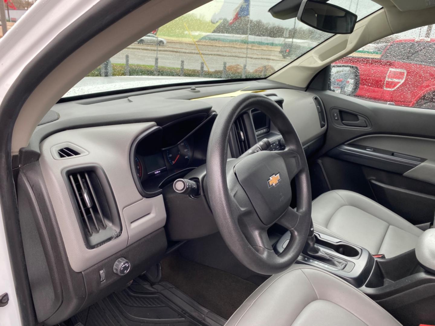 2015 WHITE Chevrolet Colorado WT Ext. Cab 2WD (1GCHSAEA6F1) with an 2.5L L4 DOHC 16V GAS engine, 6-Speed Automatic transmission, located at 420 I-35E, Lancaster, TX, 75146, (469) 297-4144, 32.593929, -96.823685 - Photo#4